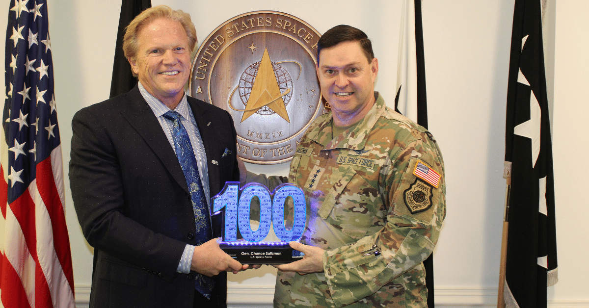 Executive Mosaic Jim Garrettson (on the left) awards Wash100 recognition to Gen. Chance Saltzman (on the right)