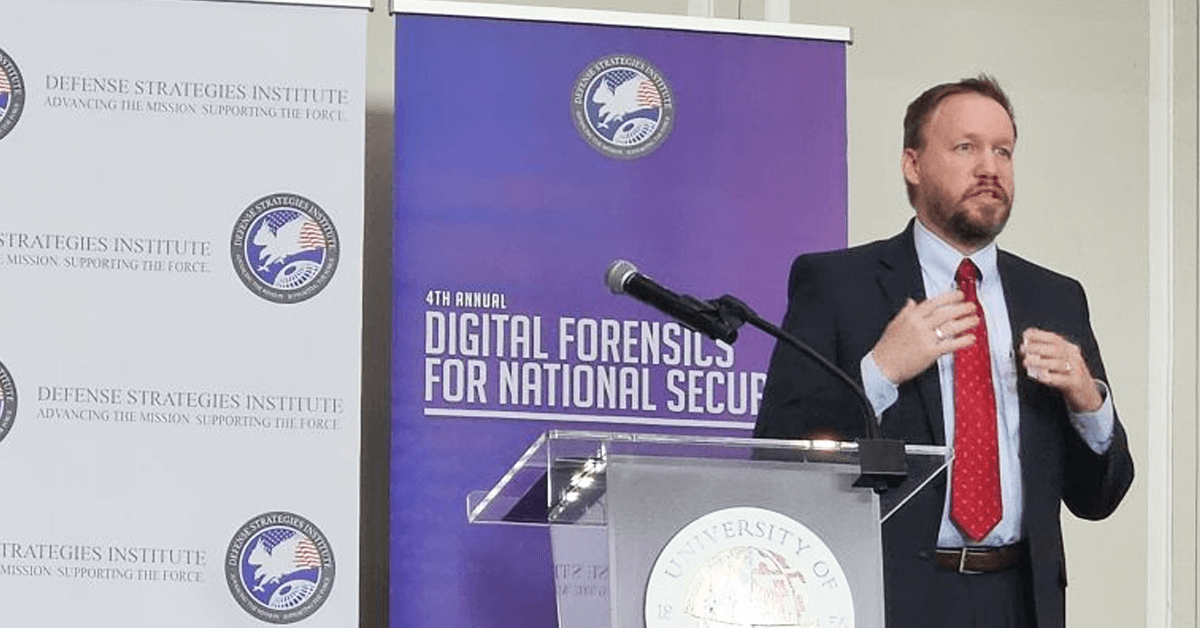 DoD Cyber Crime Center’s Deputy Director Joshua Black delivering a keynote address at the Defense Strategies Institute’s 4th Annual Digital Forensics for National Security Symposium