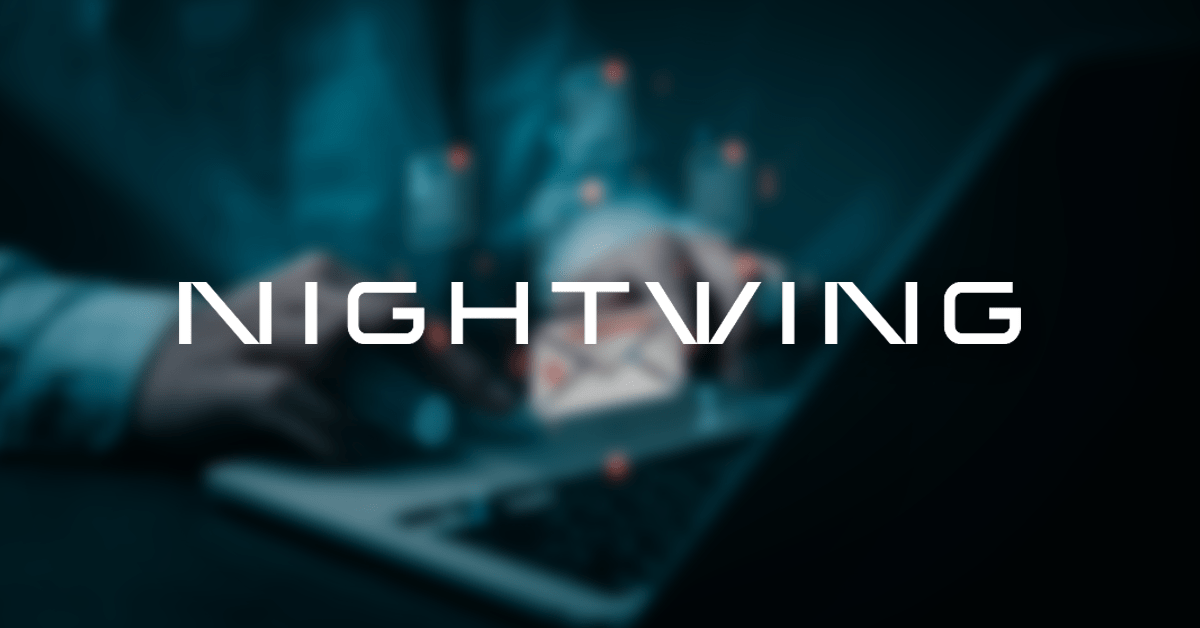 Official Nightwing logo over a blurred background photo of a person using their laptop