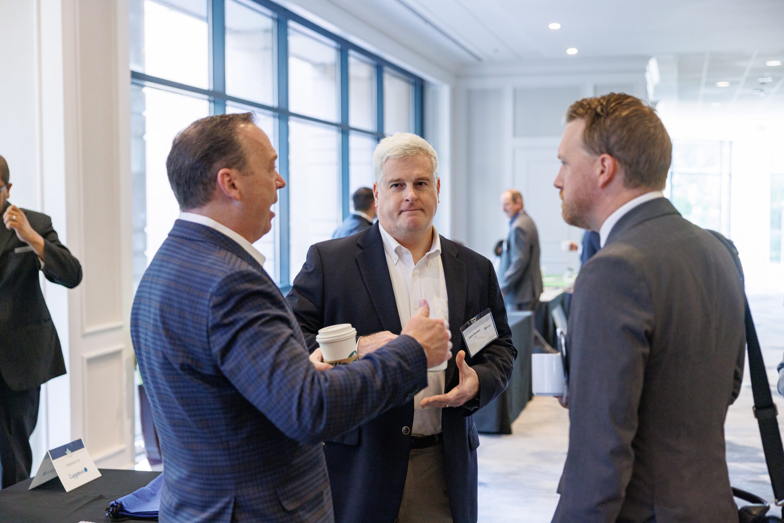 Attendees network at a Potomac Officers Club event.